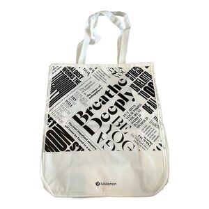 Lululemon small tote bag white with black lettering - 12”